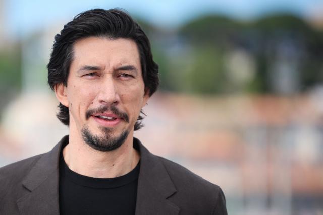 US actor Adam Driver poses during a photocall of the film "Paper Tiger" at the 79th edition of the Cannes Film Festival in Cannes, southern France on May 17, 2026. (Photo by Valery HACHE / AFP)