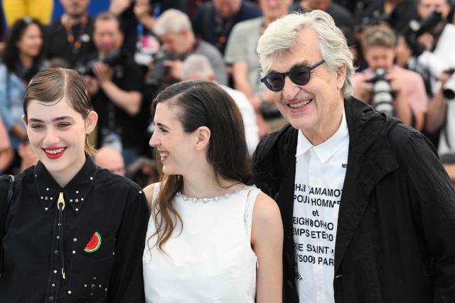 (From L) German actress Naomi Cosma, German director and writer Katharina Rivilis and German producer Wim Wenders pose during a photocall of the film "I'll Be Gone in June" at the 79th edition of the Cannes Film Festival in Cannes, southern France on May 17, 2026. (Photo by Olivier CHASSIGNOLE / AFP)