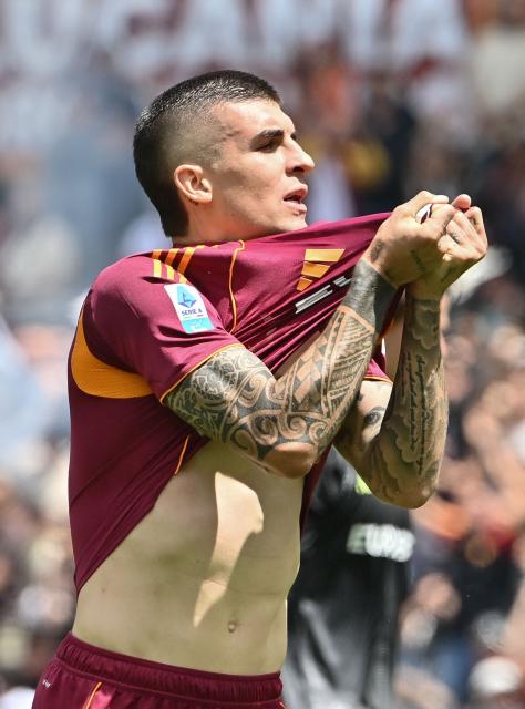 Roma's Italian defender #23 Gianluca Mancini celebrates scoring his team's first goal during the Italian Serie A football match between Roma and Lazio at Olympic stadium in Rome on May 17, 2026. (Photo by Isabella BONOTTO / AFP)