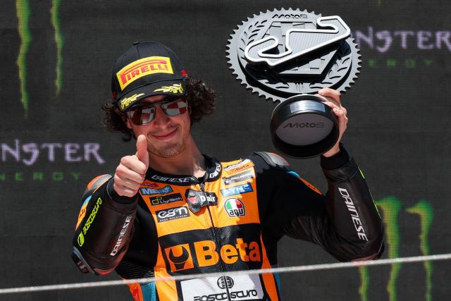 Team Speed Up Racing's Celestino Vietti celebrates his second placed finish on the podium for the Moto2 race of the 2026 Catalunya Moto Grand Prix at the Catalunya racetrack in Montmelo, near Barcelona, on May 17, 2026. (Photo by Lluis GENE / AFP)
