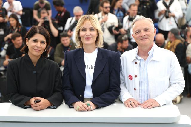 (From L) French producer Carole Lambert, French director and screennwriter Judith Godreche and French producer Marc Missonnier pose during a photocall of the film "Memoire de fille" at the 79th edition of the Cannes Film Festival in Cannes, southern France on May 17, 2026. (Photo by Sameer AL-DOUMY / AFP)