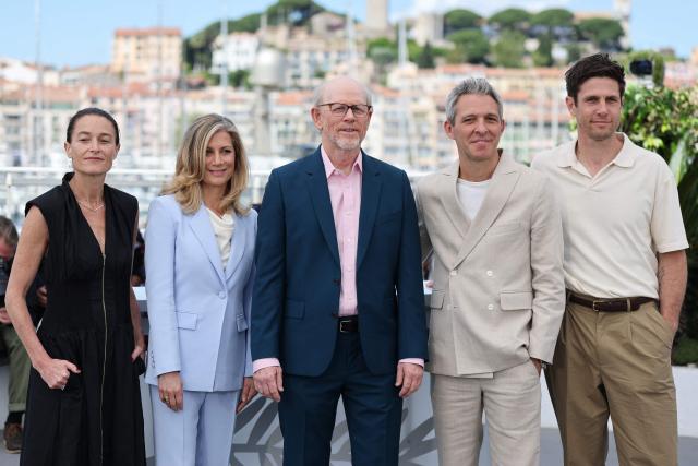 (From L) US producer Dallas Brennan Rexer, US producer Sara Bernstein, US director and producer Ron Howard, US producer Justin Wilkes and US producer Christopher St. John pose during a photocall of the film "Avedon" at the 79th edition of the Cannes Film Festival in Cannes, southern France on May 17, 2026. (Photo by Thibaud MORITZ / AFP)