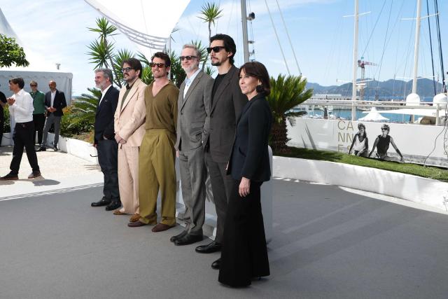 (From L) US producer Anthony Katagas, Brazilian producer Rodrigo Teixeira, US actor Miles Teller, US director and screenwriter James Gray, US actor Adam Driver and US producer Raffaella Leone pose during a photocall of the film "Paper Tiger" at the 79th edition of the Cannes Film Festival in Cannes, southern France on May 17, 2026. (Photo by Sameer AL-DOUMY / AFP)