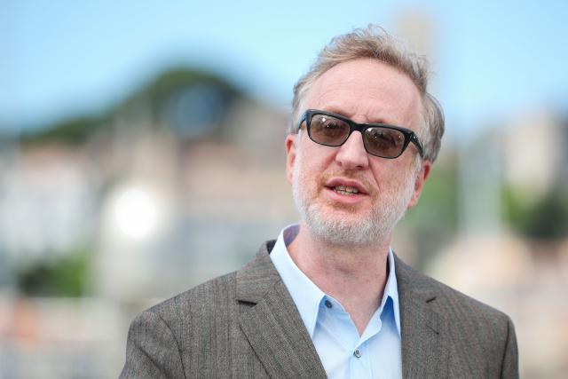 US director and screenwriter James Gray poses during a photocall of the film "Paper Tiger" at the 79th edition of the Cannes Film Festival in Cannes, southern France on May 17, 2026. (Photo by Valery HACHE / AFP)