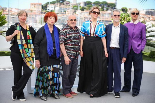 (From L) German writer Jenny Erpenbeck, German producer Regina Ziegler, German director, screenwriter and producer Volker Schloendorff, German actress Martina Gedeck, German actor Ulrich Matthes and German actress Susanne Wolff pose during a photocall of the film "Heimsuchung" (Visitation) at the 79th edition of the Cannes Film Festival in Cannes, southern France on May 17, 2026. (Photo by Valery HACHE / AFP)