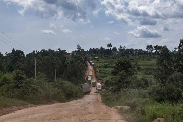 A general view of trailers who broke down on the Ugandan border with the Democratic Republic of Congo in Padea, on May 17, 2026. Ugandan officials confirmed that a 59-year-old man from DR Congo had died in Kampala after being admitted earlier in the week. His body was repatriated the same day. 
Tests showed the victim in Uganda was infected with the Bundibugyo strain of Ebola, first identified in 2007.. The World Health Organization declared an international health emergency on Sunday over an outbreak of an Ebola strain in the Democratic Republic of Congo that has killed more than 80 and for which there is no vaccine.
Fears of further spread grew when a laboratory on Sunday confirmed a case in the major eastern DRC city of Goma, which is controlled by the Rwanda-backed M23 militia.
A total of 88 deaths and 336 suspected cases of the highly contagious haemorrhagic fever have so far been reported, the Africa Centres for Disease Control and Prevention (CDC Africa) said in an update on Saturday. (Photo by Badru KATUMBA / AFP)