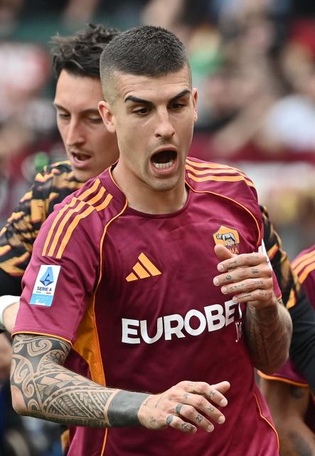 Roma's Italian defender #23 Gianluca Mancini celebrates scoring his team's second goal during the Italian Serie A football match between Roma and Lazio at Olympic stadium in Rome on May 17, 2026. (Photo by Isabella BONOTTO / AFP)