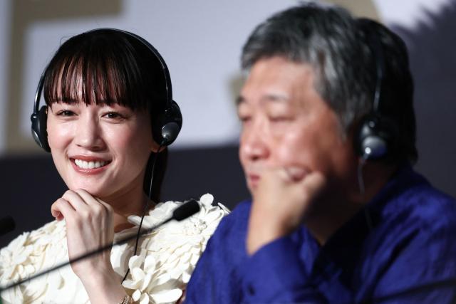 Japanese actress Haruka Ayase and Japanese director and screenwriter Hirokazu Kore-eda attend a press conference for the film "Sheep in The Box" at the 79th edition of the Cannes Film Festival in Cannes, southern France on May 17, 2026. (Photo by Ian LANGSDON / AFP)