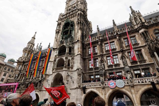 Bayern Munich's team celebrate their 35th Bundesliga championship title on the balcony at the City Hall at Marienplatz in Munich, southern Germany, on May 17, 2026. (Photo by Alexandra BEIER / AFP)