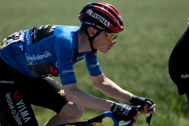 Team Visma Lease a Bike Danish rider Jonas Vingegaard, wearing the best climber's blue jersey (Maglia Azzura), rides during the 9th stage of the Giro d'Italia 2026 - Tour of Italy cycling race between Cervia and Corno alle Scale, central Italy on May 17, 2026. (Photo by Luca Bettini / AFP)