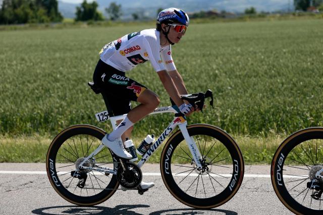 Red Bull - BORA - hansgrohe Italian rider Giulio Pellizzari rides during the 9th stage of the Giro d'Italia 2026 - Tour of Italy cycling race between Cervia and Corno alle Scale, central Italy on May 17, 2026. (Photo by Luca Bettini / AFP)