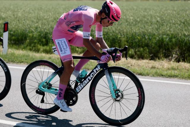 Bahrain - Victorious Portuguese rider Afonso Eulalio, wearing the overall leader's pink jersey (Maglia Rosa), rides during the 9th stage of the Giro d'Italia 2026 - Tour of Italy cycling race between Cervia and Corno alle Scale, central Italy on May 17, 2026. (Photo by Luca Bettini / AFP)