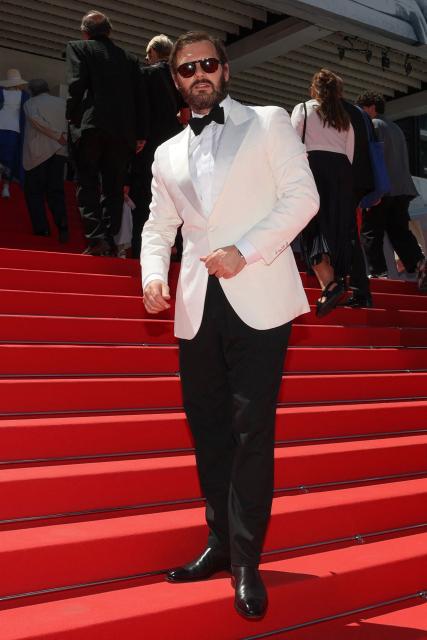 French actor Hugo Becker arrives for the screening of the film "Moulin" at the 79th edition of the Cannes Film Festival in Cannes, southern France on May 17, 2026. (Photo by Thibaud MORITZ / AFP)