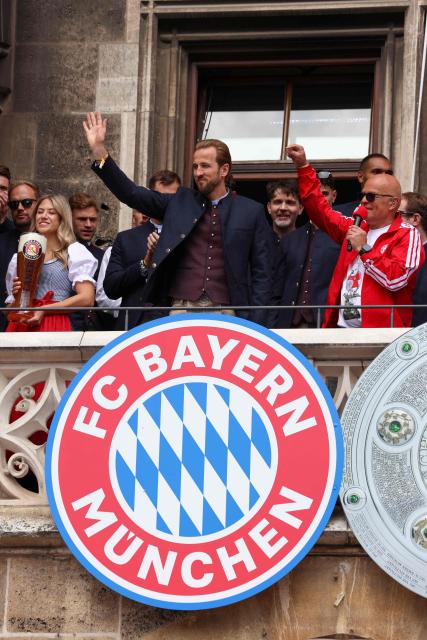 Bayern Munich's English forward #09 Harry Kane waves the crowd as Bayern Munich's players celebrate their 35th Bundesliga championship title at the City Hall at Marienplatz in Munich, southern Germany, on May 17, 2026. (Photo by Alexandra BEIER / AFP)