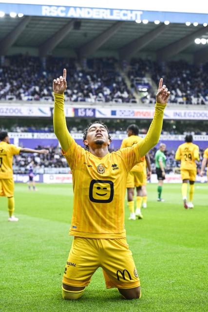 Mechelen's Dutch forward #09 Myron van Brederode celebrates after scoring during the Belgian "Pro League" Champions' play-off (day 8 out of 10) football match between RSC Anderlecht and KV Mechelen at the Stade Constant Vanden Stock, in Brussels on May 17, 2026. (Photo by Tom Goyvaerts / BELGA / AFP)