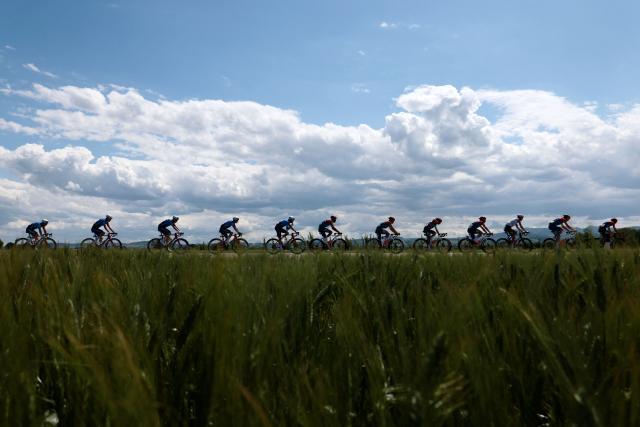 Competitors ride during the 9th stage of the Giro d'Italia 2026 - Tour of Italy cycling race between Cervia and Corno alle Scale, central Italy on May 17, 2026. (Photo by Luca Bettini / AFP)
