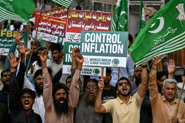 Supporters of the Pakistan's Markazi Muslim League (PMML) party shout slogans during a protest against rising fuel prices triggered by the Middle East war, in Karachi on May 17, 2026. (Photo by Asif HASSAN / AFP)