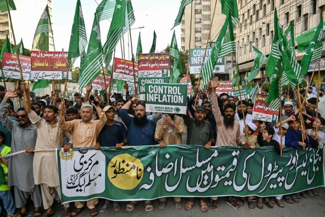 Supporters of the Pakistan's Markazi Muslim League (PMML) party shout slogans during a protest against rising fuel prices triggered by the Middle East war, in Karachi on May 17, 2026. (Photo by Asif HASSAN / AFP)