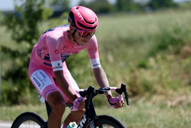 Bahrain - Victorious Portuguese rider Afonso Eulalio, wearing the overall leader's pink jersey (Maglia Rosa), rides during the 9th stage of the Giro d'Italia 2026 - Tour of Italy cycling race between Cervia and Corno alle Scale, central Italy on May 17, 2026. (Photo by Luca Bettini / AFP)