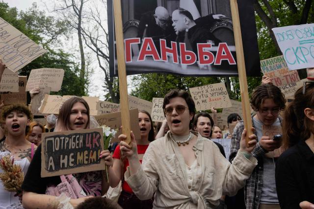 Protesters take part in a demonstration against the new Civil Code, warning it could restrict the rights of women, children, people with disabilities, and the LGBTQ community by regulating issues such as abortion, early marriage, and alimony in Kyiv on May 17, 2026, amid the Russian invasion of Ukraine. (Photo by Tetiana DZHAFAROVA / AFP)