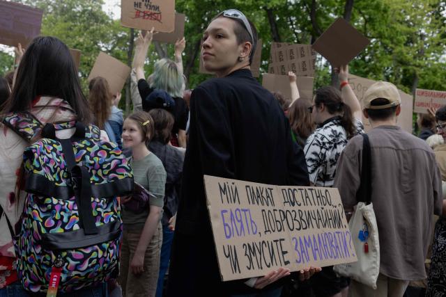 Protesters take part in a demonstration against the new Civil Code, warning it could restrict the rights of women, children, people with disabilities, and the LGBTQ community by regulating issues such as abortion, early marriage, and alimony in Kyiv on May 17, 2026, amid the Russian invasion of Ukraine. (Photo by Tetiana DZHAFAROVA / AFP)