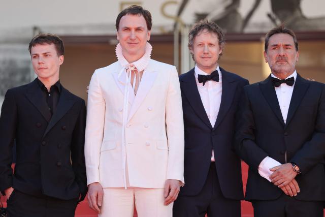 (From L) French actor Felix Lefebvre, German actor Lars Eidinger, Hungarian director Laszlo Nemes and French actor Gilles Lellouche arrive for the screening of the film "Moulin" at the 79th edition of the Cannes Film Festival in Cannes, southern France on May 17, 2026. (Photo by Thibaud MORITZ / AFP)