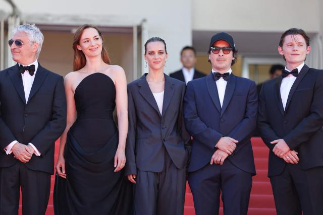 (From L) French producer Alain Goldman, French actress Louise Bourgoin, French actress Hortense Quentin De Gromard and French screenwriter Olivier Demangel arrive for the screening of the film "Moulin" at the 79th edition of the Cannes Film Festival in Cannes, southern France on May 17, 2026. (Photo by Thibaud MORITZ / AFP)