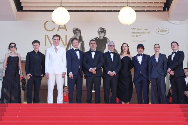 (From L) French composer Laetitia Pansanel-Garric, French actor Felix Lefebvre, German actor Lars Eidinger, Hungarian director Laszlo Nemes, French actor Gilles Lellouche, French producer Alain Goldman, French actress Louise Bourgoin, French screenwriter Olivier Demangel, French actress Hortense Quentin De Gromard arrive for the screening of the film "Moulin" at the 79th edition of the Cannes Film Festival in Cannes, southern France on May 17, 2026. (Photo by Thibaud MORITZ / AFP)