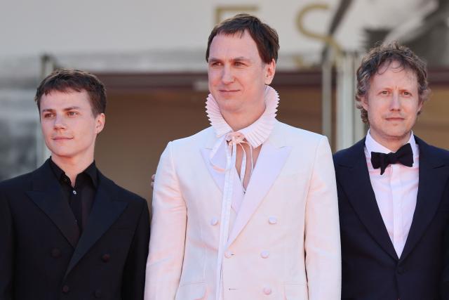 (From L) French actor Felix Lefebvre, German actor Lars Eidinger, Hungarian director Laszlo Nemes arrive for the screening of the film "Moulin" at the 79th edition of the Cannes Film Festival in Cannes, southern France on May 17, 2026. (Photo by Thibaud MORITZ / AFP)