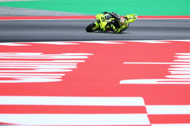 TOPSHOT - Team Pertamina Enduro VR46 Racing Team's Fabio Di Giannantonio rides during the 2026 Catalunya Moto GP Grand Prix at the Catalunya racetrack in Montmelo, near Barcelona, on May 17, 2026. (Photo by JOSE JORDAN / AFP)