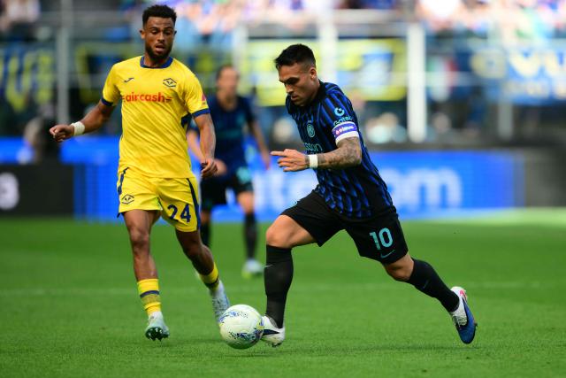 Inter Milan's Argentinian forward #10 Lautaro Martinez controls the ball next to Hellas Verona's French midfielder #24 Antoine Bernede during the Italian Serie A football match between Inter Milan and Hellas Verona at San Siro stadium in Milan, on May 17, 2026. (Photo by Marco BERTORELLO / AFP)