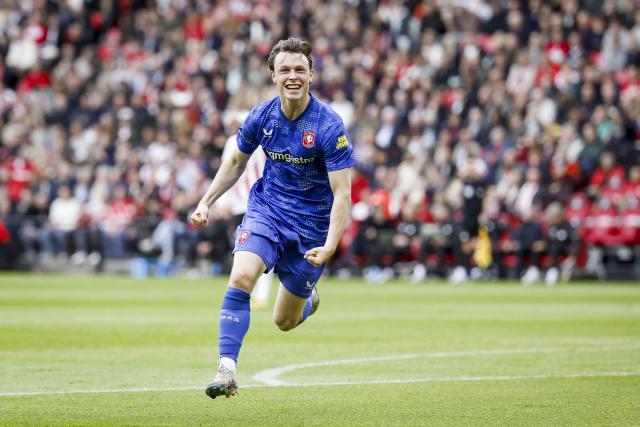 FC Twente's Norwegian forward Sondre Orjasaeter celebrates scoring an equalizer during the Dutch Eredivisie football match between PSV Eindhoven and FC Twente at the Philips Stadium in Eindhoven on May 17, 2026 . (Photo by Bas Czerwinski / ANP / AFP) / Netherlands OUT