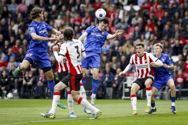 FC Twente's Norwegian forward Sondre Orjasaeter heads the ball during the Dutch Eredivisie football match between PSV Eindhoven and FC Twente at the Philips Stadium in Eindhoven on May 17, 2026 . (Photo by Bas Czerwinski / ANP / AFP) / Netherlands OUT