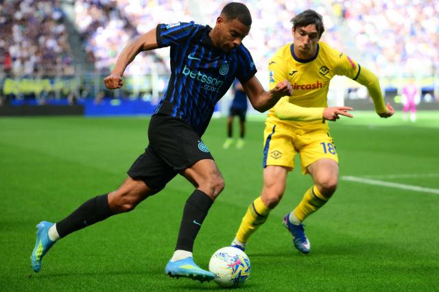 Inter Milan's French midfielder #17 Andy Diouf controls the ball during the Italian Serie A football match between Inter Milan and Hellas Verona at San Siro stadium in Milan, on May 17, 2026. (Photo by Marco BERTORELLO / AFP)