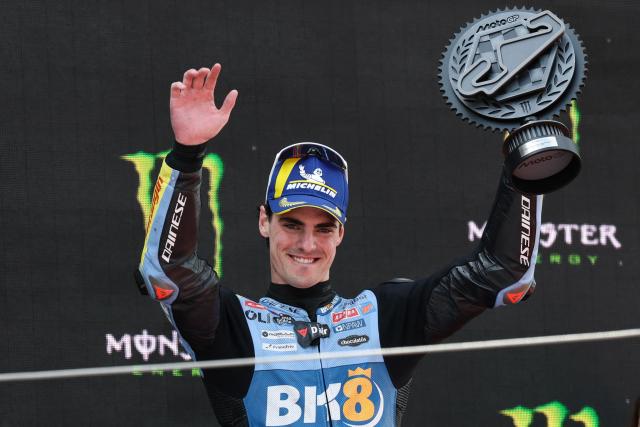 Team Gresini Racing MotoGP's Fermin Aldeguer celebrates his third place on the podium for the 2026 Catalunya Moto GP Grand Prix at the Catalunya racetrack in Montmelo, near Barcelona, on May 17, 2026. (Photo by Lluis GENE / AFP)
