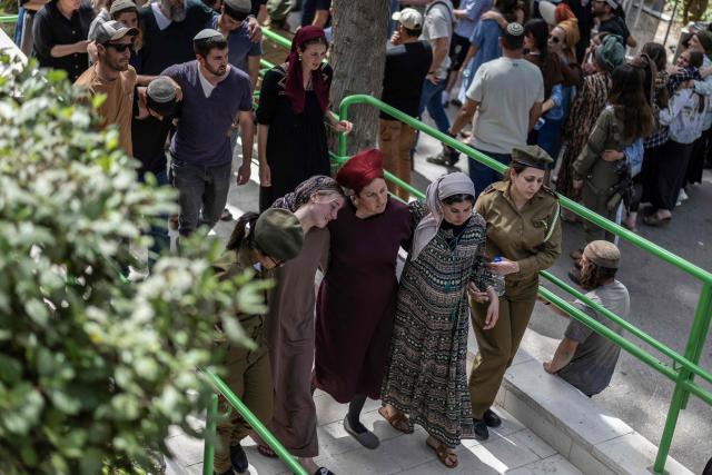 Family members mourn Israeli army Captain Maoz Israel Recanati, who was killed in combat in Lebanon, during the funeral in Jerusalem on May 17, 2026. Israel's military said on May 16 that Recanati died in combat in southern Lebanon, without providing additional information, bringing its losses to 21 personnel since the war with Hezbollah began in early March. Since the war began, 20 Israeli soldiers and one civilian contractor have been killed. (Photo by ilia YEFIMOVICH / AFP)