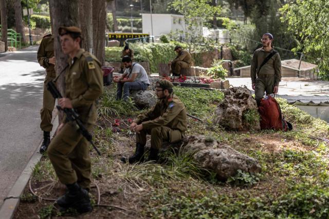Soldiers mourn Israeli army Captain Maoz Israel Recanati, who was killed in combat in Lebanon, during the funeral in Jerusalem on May 17, 2026. Israel's military said on May 16 that Recanati died in combat in southern Lebanon, without providing additional information, bringing its losses to 21 personnel since the war with Hezbollah began in early March. Since the war began, 20 Israeli soldiers and one civilian contractor have been killed. (Photo by ilia YEFIMOVICH / AFP)
