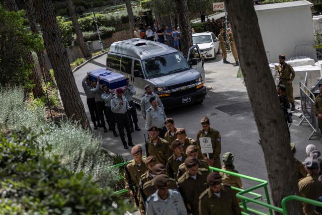 Soldiers carry the casket of Israeli army Captain Maoz Israel Recanati, who was killed in combat in Lebanon, during the funeral in Jerusalem on May 17, 2026. Israel's military said on May 16 that Recanati died in combat in southern Lebanon, without providing additional information, bringing its losses to 21 personnel since the war with Hezbollah began in early March. Since the war began, 20 Israeli soldiers and one civilian contractor have been killed. (Photo by ilia YEFIMOVICH / AFP)