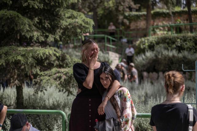 Family members mourn Israeli army Captain Maoz Israel Recanati, who was killed in combat in Lebanon, during the funeral in Jerusalem on May 17, 2026. Israel's military said on May 16 that Recanati died in combat in southern Lebanon, without providing additional information, bringing its losses to 21 personnel since the war with Hezbollah began in early March. Since the war began, 20 Israeli soldiers and one civilian contractor have been killed. (Photo by ilia YEFIMOVICH / AFP)