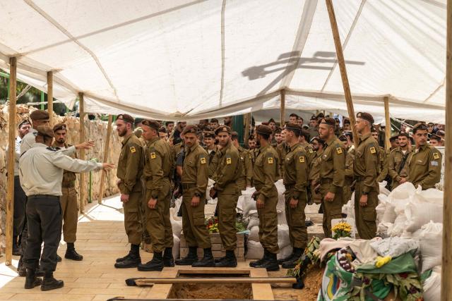 Soldiers take formation during the funeral of Israeli army Captain Maoz Israel Recanati, who was killed in combat in Lebanon, during the funeral in Jerusalem on May 17, 2026. Israel's military said on May 16 that Recanati died in combat in southern Lebanon, without providing additional information, bringing its losses to 21 personnel since the war with Hezbollah began in early March. Since the war began, 20 Israeli soldiers and one civilian contractor have been killed. (Photo by ilia YEFIMOVICH / AFP)
