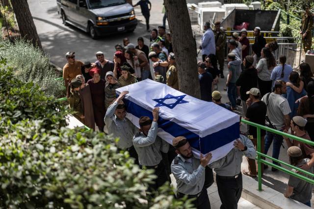 EDITORS NOTE: Graphic content / Soldiers carry the casket of Israeli army Captain Maoz Israel Recanati, who was killed in combat in Lebanon, during the funeral in Jerusalem on May 17, 2026. Israel's military said on May 16 that Recanati died in combat in southern Lebanon, without providing additional information, bringing its losses to 21 personnel since the war with Hezbollah began in early March. Since the war began, 20 Israeli soldiers and one civilian contractor have been killed. (Photo by ilia YEFIMOVICH / AFP)