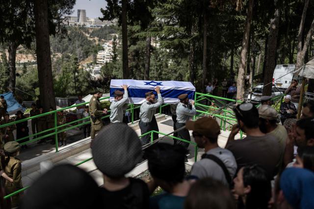 EDITORS NOTE: Graphic content / Soldiers carry the casket of Israeli army Captain Maoz Israel Recanati, who was killed in combat in Lebanon, during the funeral in Jerusalem on May 17, 2026. Israel's military said on May 16 that Recanati died in combat in southern Lebanon, without providing additional information, bringing its losses to 21 personnel since the war with Hezbollah began in early March. Since the war began, 20 Israeli soldiers and one civilian contractor have been killed. (Photo by ilia YEFIMOVICH / AFP)