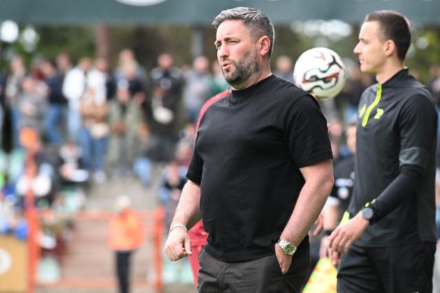 Lommel's English head coach Lee Johnson reacts during the Belgian "Pro League" Champions' play-off (day 8 out of 10) football match between Lommel SK and FCV Dender EH in Lommel on May 17, 2026. (Photo by JILL DELSAUX / Belga / AFP) / Belgium OUT