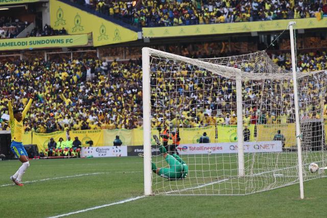 AS FAR's Moroccan goalkeeper #16 Reda Tagnaouti fails to stop a goal during the CAF Champions League final first leg football match between Mamelodi Sundowns and AS FAR (Association Sportive des Forces Armees Royales - Royal Army Club) at Loftus Versfeld Stadium in Pretoria on May 17, 2026. (Photo by Phill Magakoe / AFP)