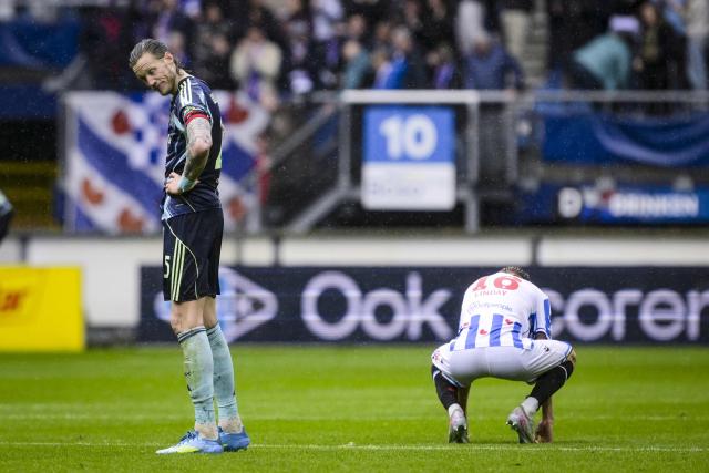 Ajax's Dutch defender #25 Wout Weghorst (L) reacts during the Dutch Eredivisie football match between SC Heerenveen and AFC Ajax at the Abe Lenstra in Heerenveen on May 17, 2026. (Photo by Olaf Kraak / ANP / AFP) / Netherlands OUT