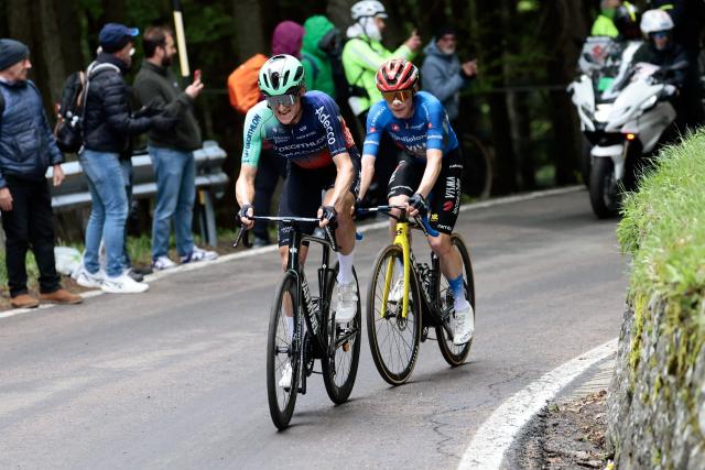 Decathlon CMA CGM Team Austrian rider Felix Gall rides in front of Team Visma Lease a Bike Danish rider Jonas Vingegaard during the 9th stage of the Giro d'Italia 2026 - Tour of Italy cycling race between Cervia and Corno alle Scale, central Italy on May 17, 2026. (Photo by Luca Bettini / AFP)