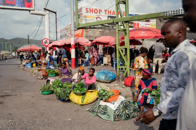 Street vendors wait for customers at the Birere Market near the Petite Barriere in Goma on May 17, 2026. A first case of Ebola virus infection has been reported in Goma, a major city in eastern Democratic Republic of Congo controlled by the M23 armed group, with the WHO declaring an international health alert on May 17, 2026.
According to figures released Saturday by the African Unions health agency (Africa CDC), 88 deaths likely caused by the virus have been recorded, out of 336 suspected cases. One death has been reported in neighboring Uganda. As the epicenter of the outbreak is located in a hard-to-reach area, few samples have been tested in laboratories and the figures are based largely on suspected cases. (Photo by Jospin Mwisha / AFP)