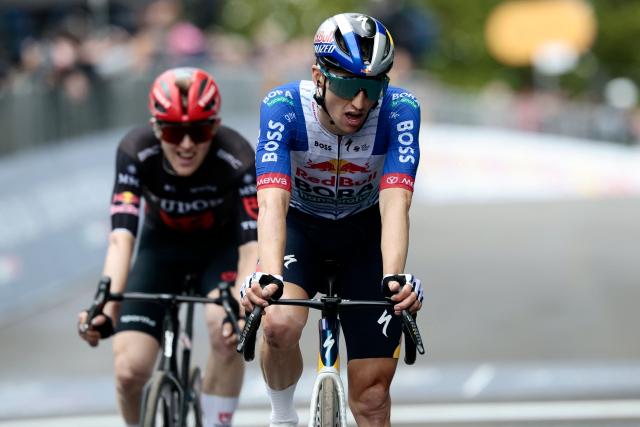 Red Bull - BORA - hansgrohe Australian rider Jai Hindley crosses the finish line at the end of the 9th stage of the Giro d'Italia 2026 - Tour of Italy cycling race between Cervia and Corno alle Scale, near Doganaccia, central Italy on May 17, 2026. (Photo by Luca Bettini / AFP)