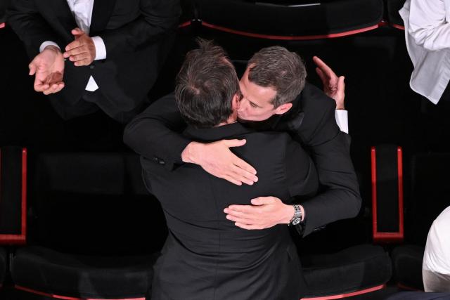 French actor Gilles Lellouche (L) greets French actor and director Guillaume Canet at the end of the screening of the film "Moulin" at the 79th edition of the Cannes Film Festival in Cannes, southern France on May 17, 2026. (Photo by Antonin THUILLIER / AFP)