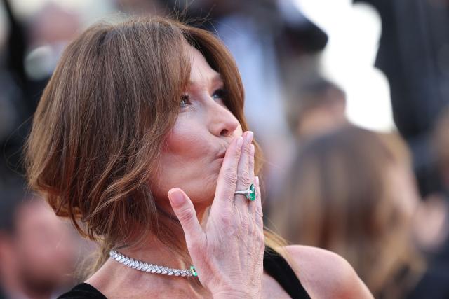 Italian-French singer Carla Bruni arrives for the screening of the film "Garance" (Another Day) at the 79th edition of the Cannes Film Festival in Cannes, southern France on May 17, 2026. (Photo by Valery HACHE / AFP)